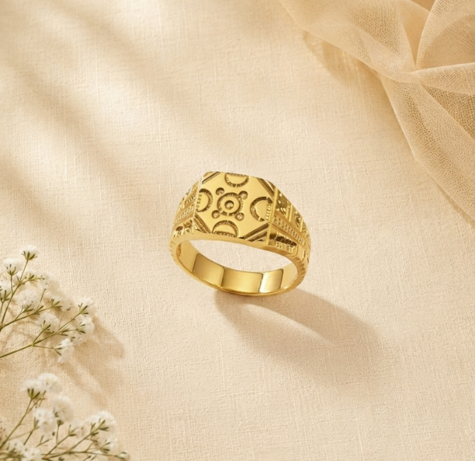 22KT gold men's ring with antique oxidized finish and engraved floral design, white gold stone centre