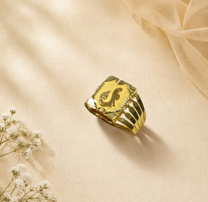 22KT gold men's ring with engraved traditional symbol and fluted textured sides
