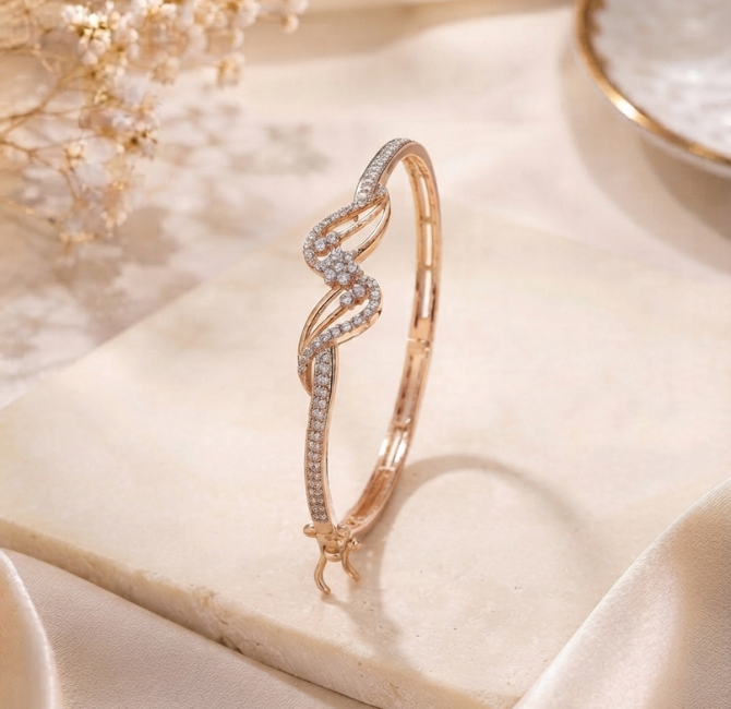 Flowing wave design in rose gold