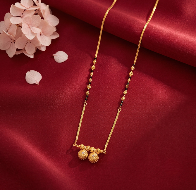 Twin gold filigree ball pendant with CZ accents