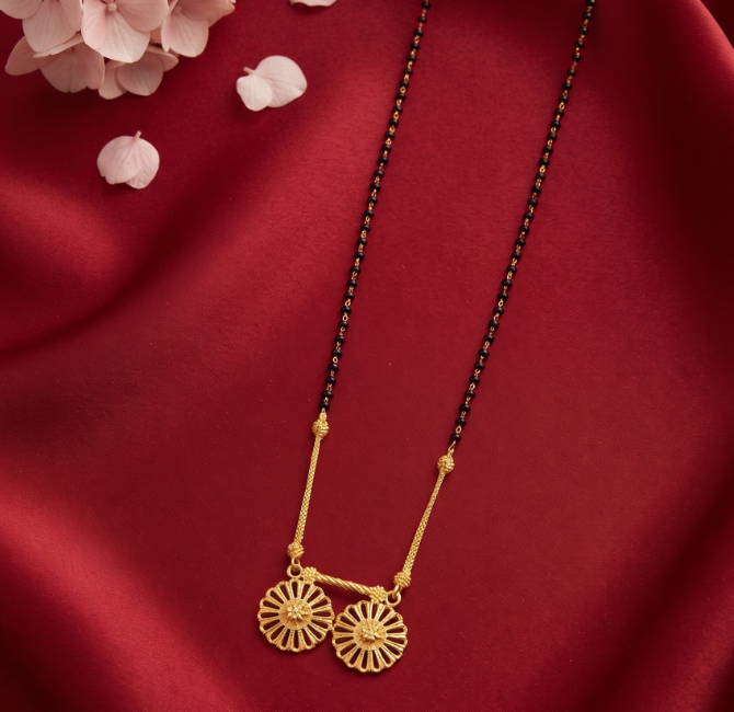 Twin sunflower gold pendant on black-bead chain